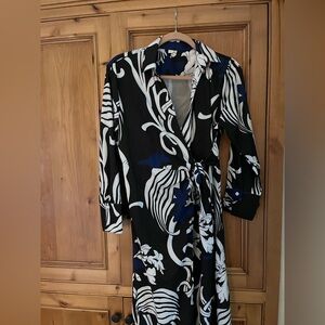 Black and White Patterned Dress with Blue Accents